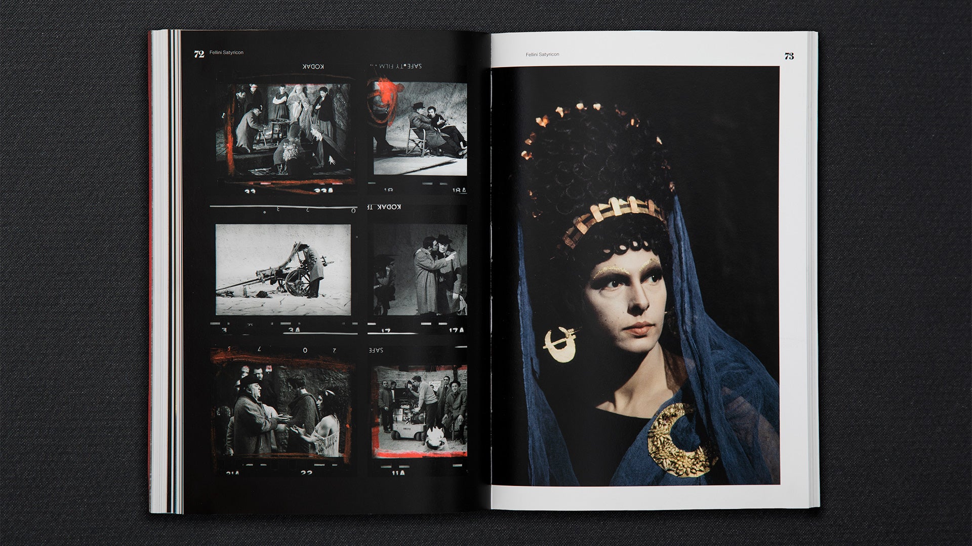 Open book showing a page with a black and white image of a person wearing a headscarf and gold jewelry.