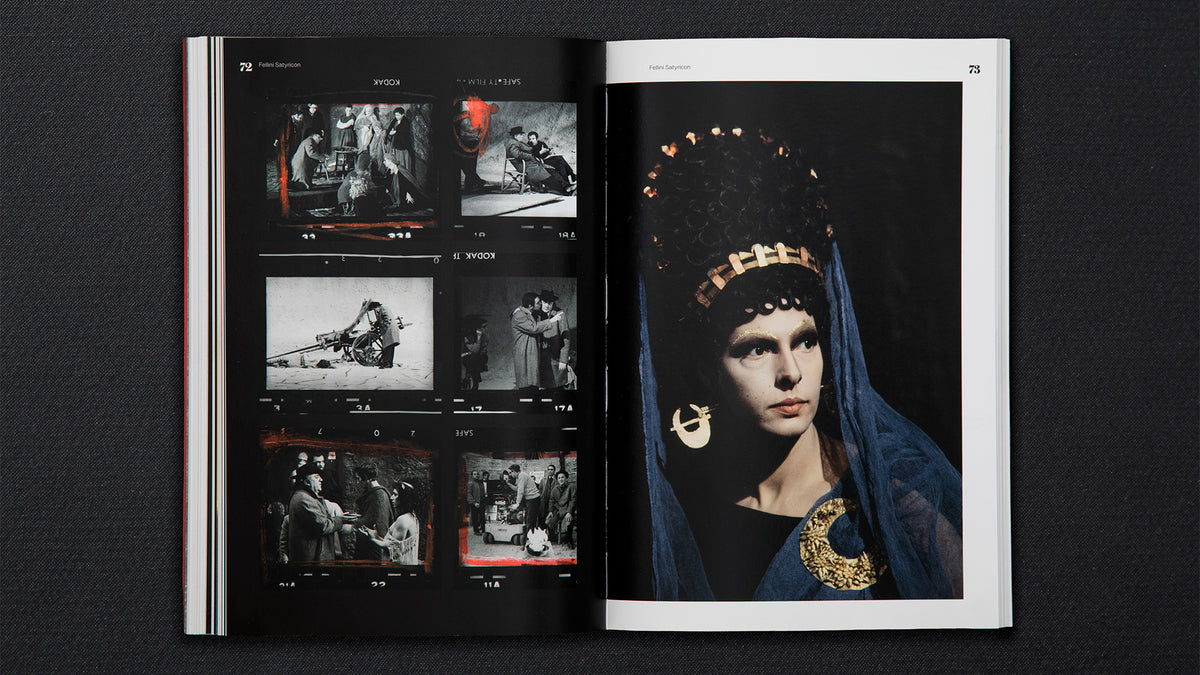 Open book showing a page with a black and white image of a person wearing a headscarf and gold jewelry.